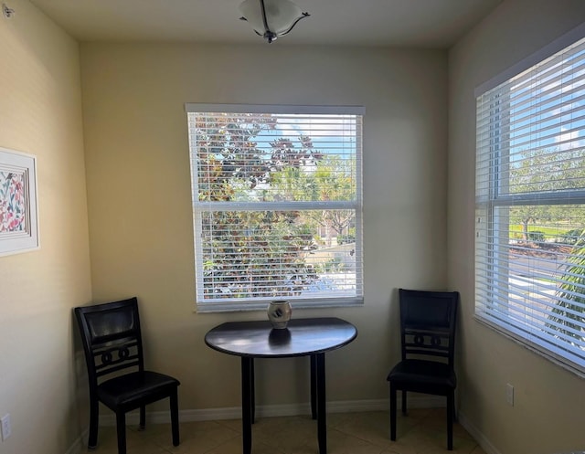 7911 Grand Estuary Trl Unit 201, Bradenton, FL 34212 - sitting room featuring healthy amount of natural light and tile patterned flooring