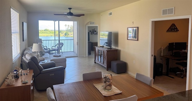 7911 Grand Estuary Trl Unit 201, Bradenton, FL 34212 - living room featuring light tile patterned floors, ceiling fan, and baseboards