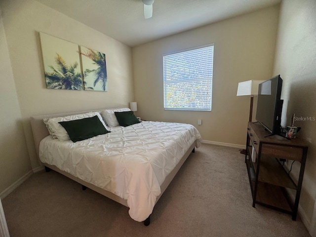 7911 Grand Estuary Trl Unit 201, Bradenton, FL 34212 - carpeted bedroom featuring baseboards and a ceiling fan