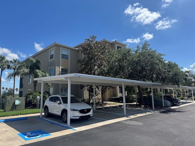 7911 Grand Estuary Trl Unit 201, Bradenton, FL 34212 - view of covered parking lot
