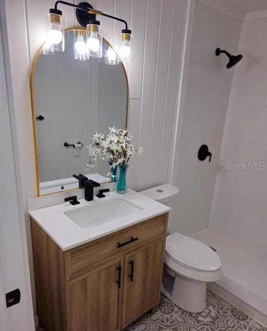 16079 SE Janet St, Blountstown, FL 32424 - bathroom with a shower stall, vanity, toilet, tile patterned floors, and a chandelier