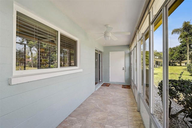 602 Park Cir, Bradenton, FL 34207 - unfurnished sunroom featuring ceiling fan