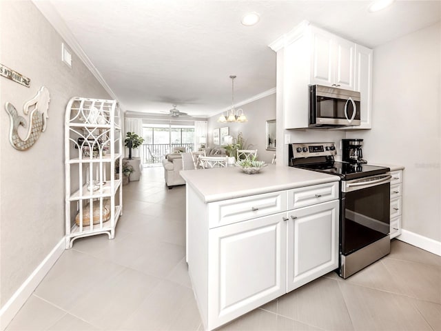 5669 Midnight Pass Rd Unit 308, Sarasota, FL 34242 - kitchen with appliances with stainless steel finishes, baseboards, light tile patterned floors, open floor plan, and white cabinets