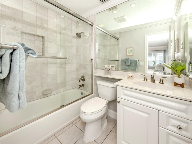 5669 Midnight Pass Rd Unit 308, Sarasota, FL 34242 - bathroom with ornamental molding, tile patterned floors, combined bath / shower with glass door, toilet, and vanity