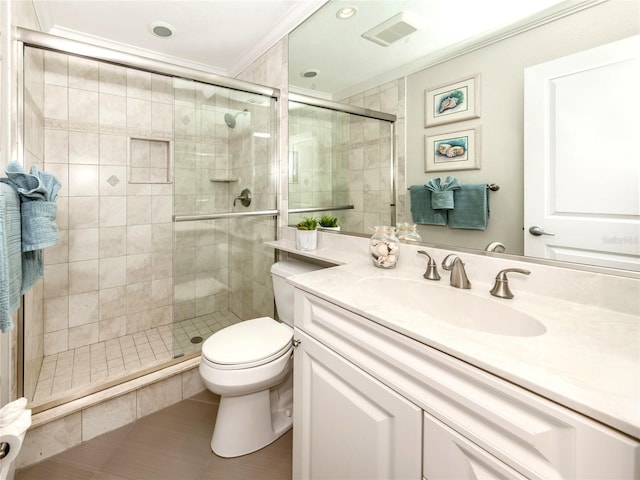 5669 Midnight Pass Rd Unit 308, Sarasota, FL 34242 - full bathroom featuring ornamental molding, a shower stall, toilet, vanity, and tile patterned flooring