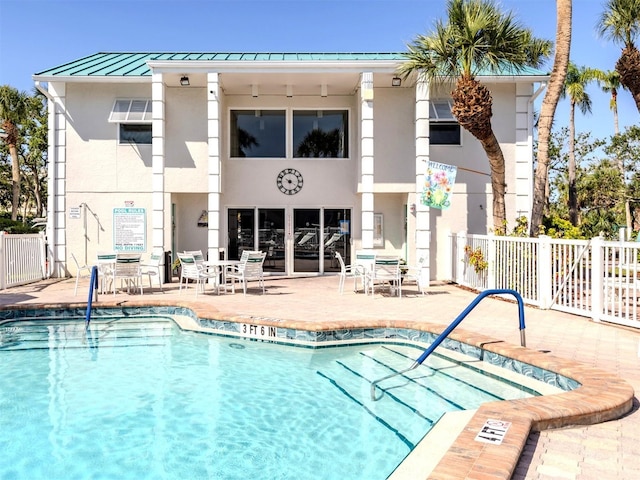 5669 Midnight Pass Rd Unit 308, Sarasota, FL 34242 - community pool with fence and a patio area