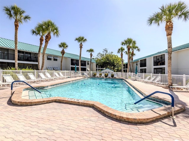 5669 Midnight Pass Rd Unit 308, Sarasota, FL 34242 - community pool featuring fence and a patio