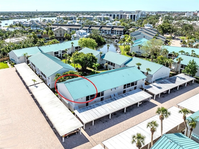 5669 Midnight Pass Rd Unit 308, Sarasota, FL 34242 - aerial perspective of suburban area with a nearby body of water