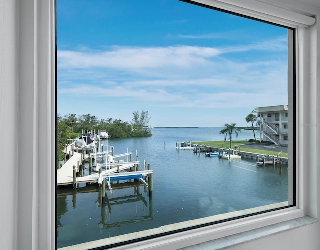 water view featuring boat lift and a boat dock