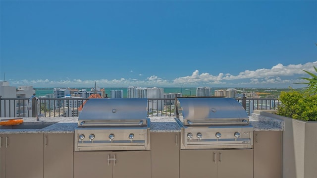 33 S Palm Ave Unit 1303, Sarasota, FL 34236 - view of patio with grilling area, area for grilling, a sink, and a city view
