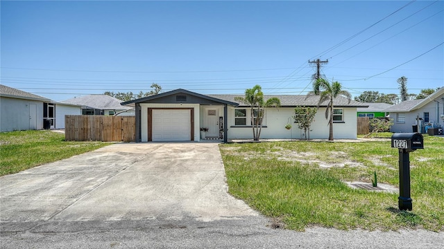 1227 Porpoise Rd, Venice, FL 34293 - ranch-style house with an attached garage and concrete driveway