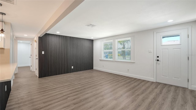 1227 Porpoise Rd, Venice, FL 34293 - entryway with light wood finished floors, recessed lighting, and baseboards