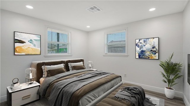 1227 Porpoise Rd, Venice, FL 34293 - bedroom with wood finished floors, baseboards, and recessed lighting