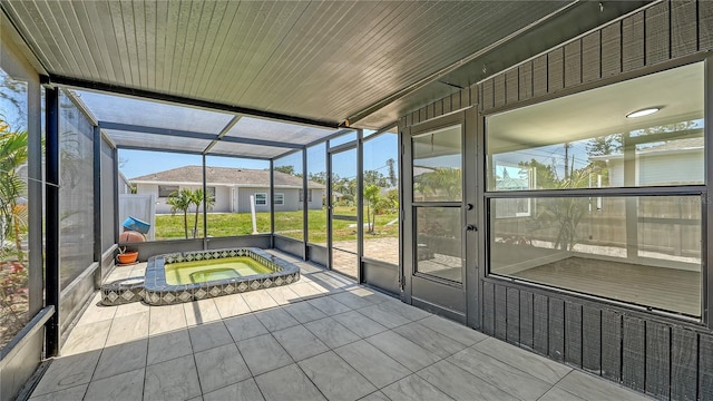 1227 Porpoise Rd, Venice, FL 34293 - sunroom with a hot tub