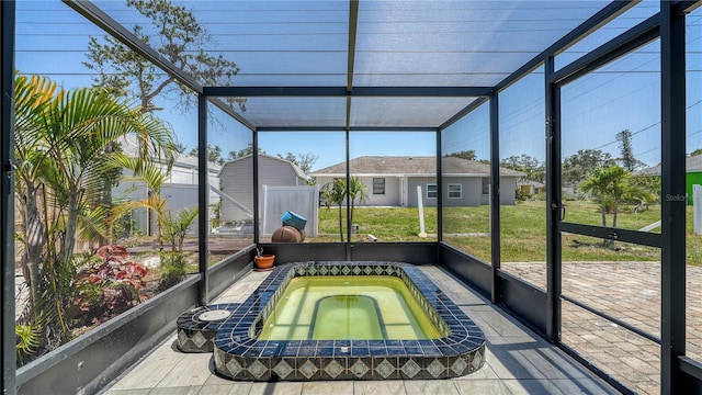 1227 Porpoise Rd, Venice, FL 34293 - sunroom / solarium featuring a jacuzzi and healthy amount of natural light
