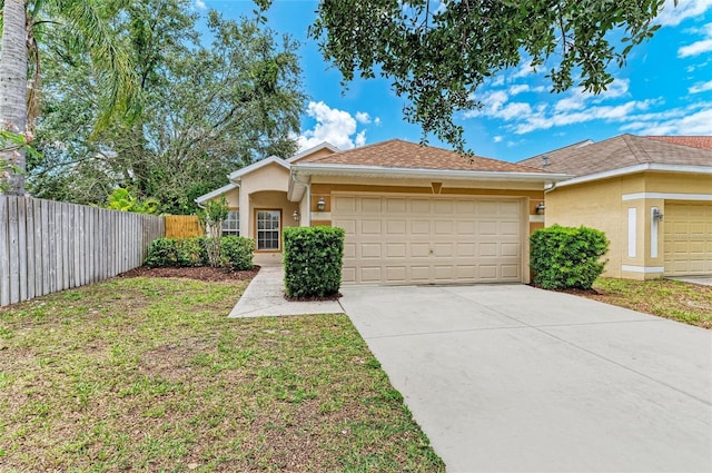 ranch-style house featuring stucco siding, an attached garage, and concrete driveway