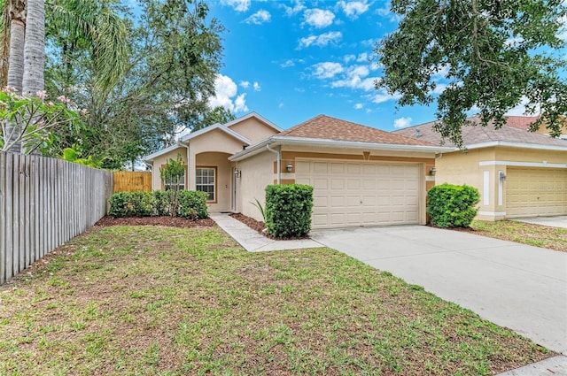 single story home featuring an attached garage, stucco siding, and concrete driveway