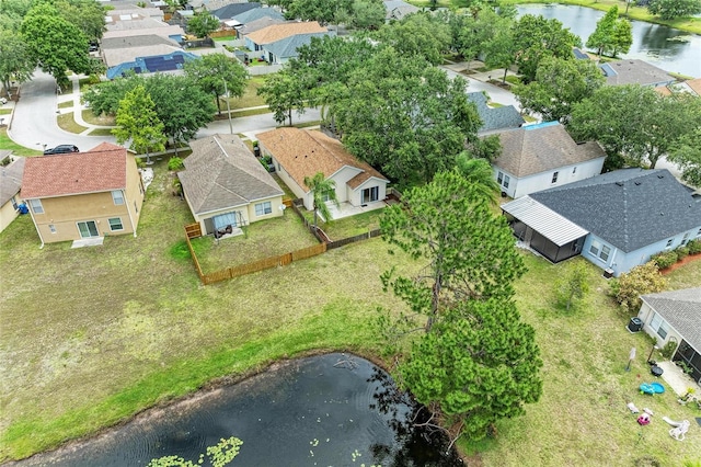 aerial perspective of suburban area featuring a large body of water