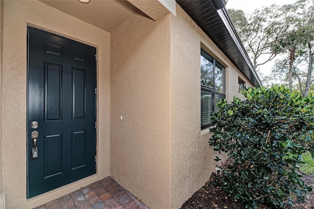 12091 Firewheel Pl, Venice, FL 34293 - entrance to property with stucco siding