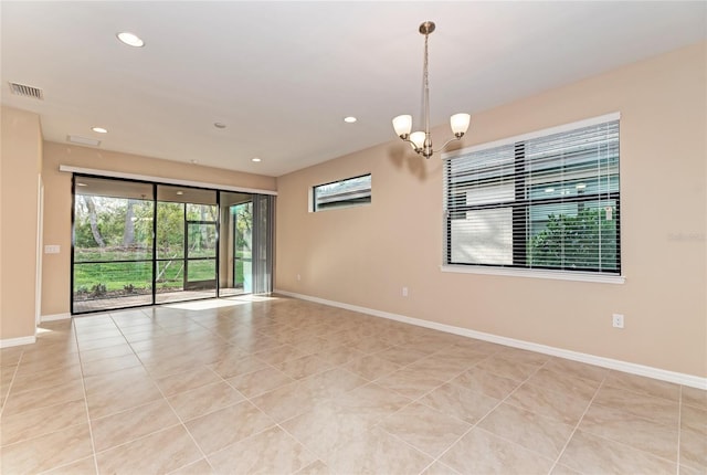 12091 Firewheel Pl, Venice, FL 34293 - unfurnished room featuring baseboards, light tile patterned floors, a chandelier, and recessed lighting