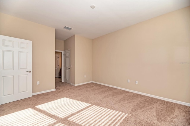 12091 Firewheel Pl, Venice, FL 34293 - unfurnished bedroom with light carpet and baseboards