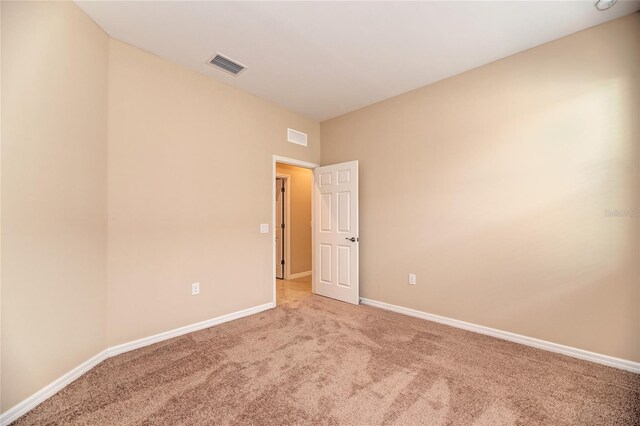 12091 Firewheel Pl, Venice, FL 34293 - carpeted empty room with baseboards