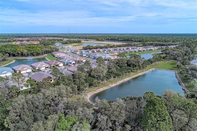 12091 Firewheel Pl, Venice, FL 34293 - aerial view of property and surrounding area with a large body of water and nearby suburban area