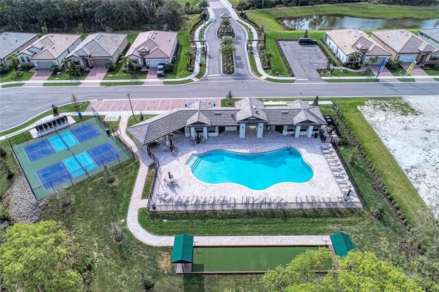12091 Firewheel Pl, Venice, FL 34293 - bird's eye view of a pool area and a nearby body of water