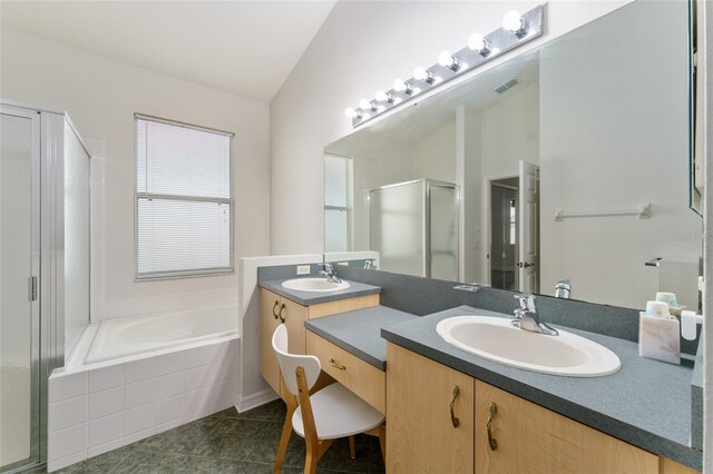 777 Summit Greens Blvd, Clermont, FL 34711 - bathroom featuring a shower stall, a bath, vanity, tile patterned flooring, and lofted ceiling