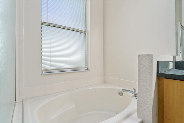 777 Summit Greens Blvd, Clermont, FL 34711 - bathroom featuring a bath and vanity