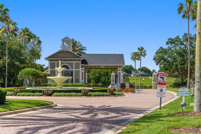 777 Summit Greens Blvd, Clermont, FL 34711 - view of home's community with a lawn