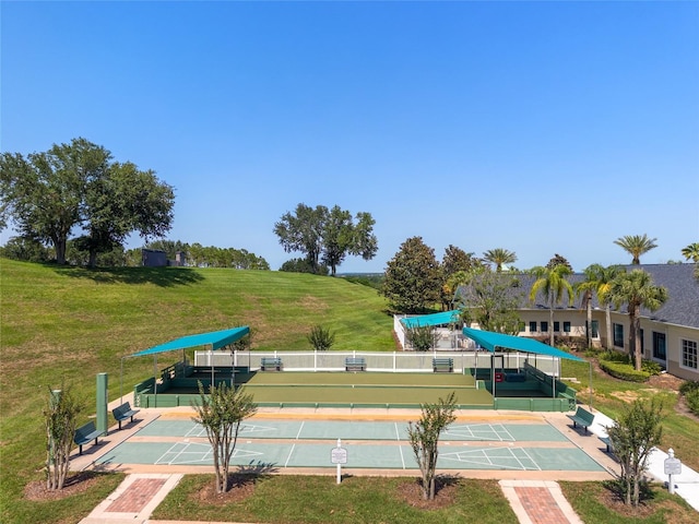 777 Summit Greens Blvd, Clermont, FL 34711 - surrounding community with shuffleboard and a lawn