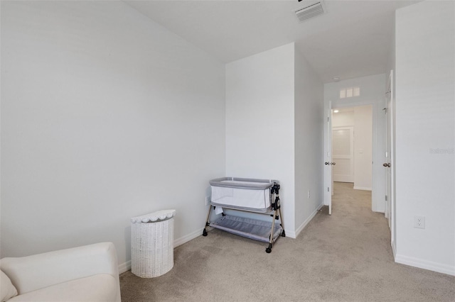 unfurnished bedroom with carpet flooring and baseboards