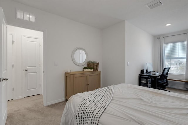 bedroom with light carpet, baseboards, and recessed lighting