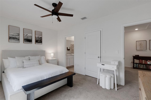 bedroom with light colored carpet, connected bathroom, ceiling fan, and recessed lighting