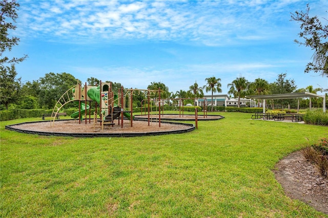 communal playground featuring a yard