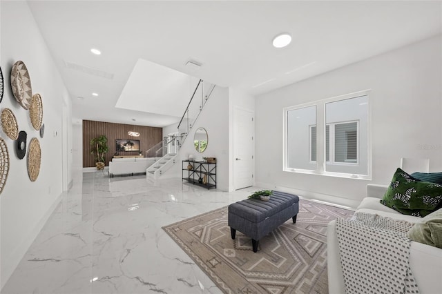 4726 Rivetta Ct, Sarasota, FL 34231 - living room with marble tiled floors, stairway, recessed lighting, and baseboards