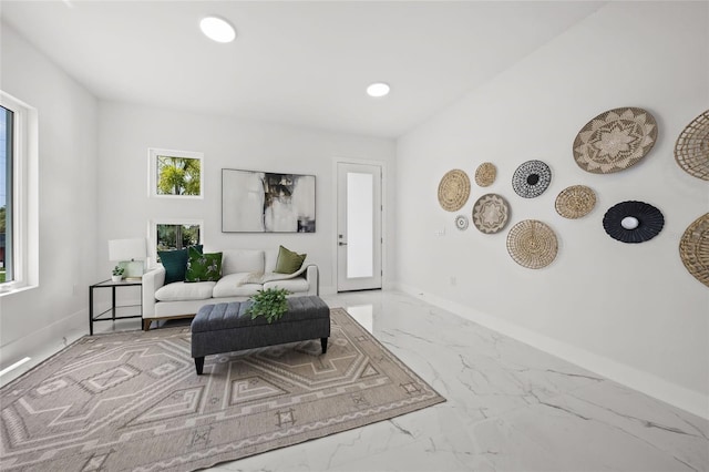 4726 Rivetta Ct, Sarasota, FL 34231 - living room with marble finish floors, baseboards, and recessed lighting