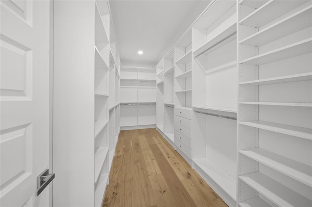 4726 Rivetta Ct, Sarasota, FL 34231 - spacious closet featuring light wood-style floors