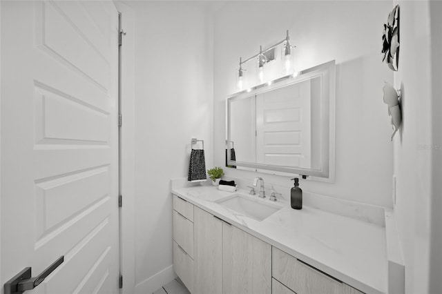 4726 Rivetta Ct, Sarasota, FL 34231 - bathroom featuring vanity and baseboards