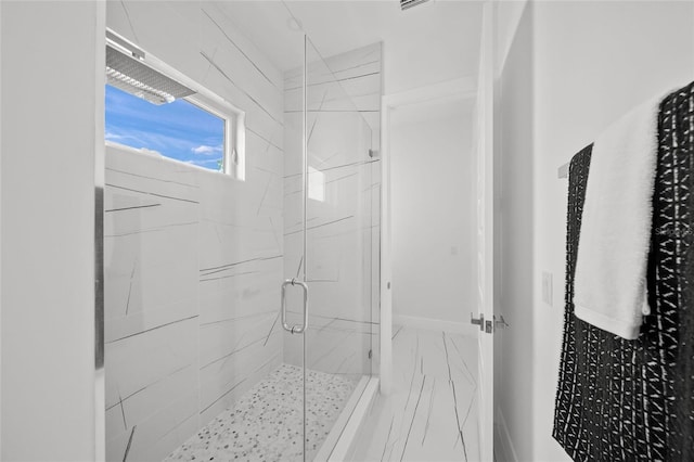 4726 Rivetta Ct, Sarasota, FL 34231 - bathroom featuring a marble finish shower