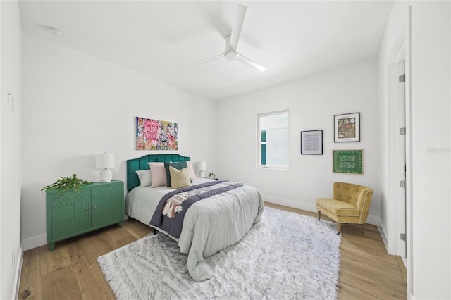 4726 Rivetta Ct, Sarasota, FL 34231 - bedroom with light wood-style floors, baseboards, and ceiling fan