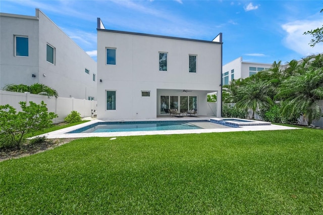 4726 Rivetta Ct, Sarasota, FL 34231 - back of property featuring ceiling fan, stucco siding, a patio, and a pool with connected hot tub