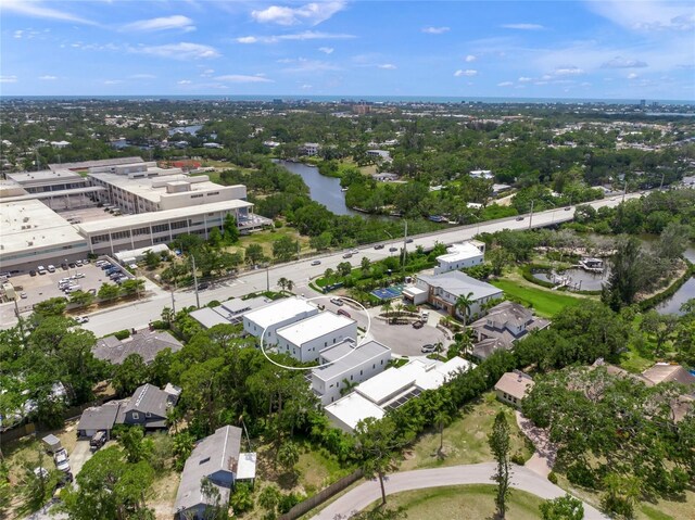 4726 Rivetta Ct, Sarasota, FL 34231 - bird's eye view of a large body of water and a tree filled landscape