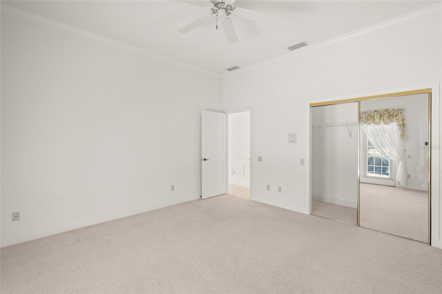 8 Dominica Dr, Englewood, FL 34223 - unfurnished bedroom with ornamental molding, carpet flooring, baseboards, a closet, and ceiling fan