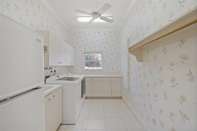 8 Dominica Dr, Englewood, FL 34223 - washroom with crown molding, separate washer and dryer, ceiling fan, light tile patterned flooring, and cabinet space