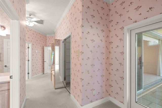 8 Dominica Dr, Englewood, FL 34223 - bathroom featuring crown molding, wallpapered walls, a ceiling fan, vanity, and baseboards
