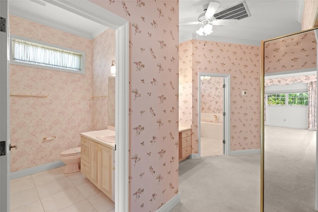 8 Dominica Dr, Englewood, FL 34223 - bathroom featuring plenty of natural light, vanity, a ceiling fan, ornamental molding, and toilet