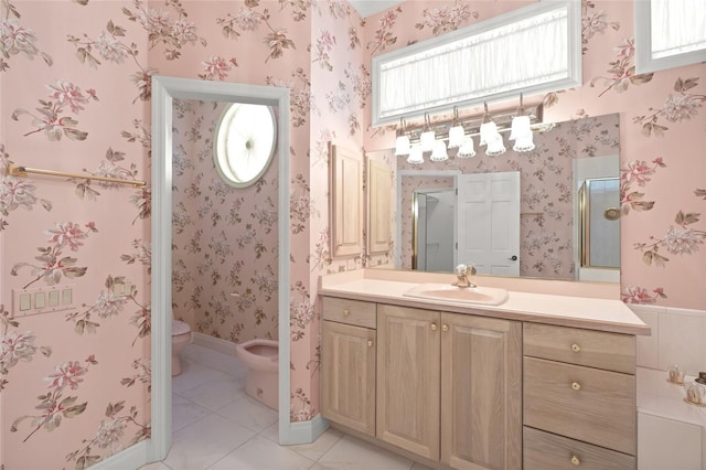 8 Dominica Dr, Englewood, FL 34223 - bathroom featuring a bidet, vanity, toilet, and tile patterned floors