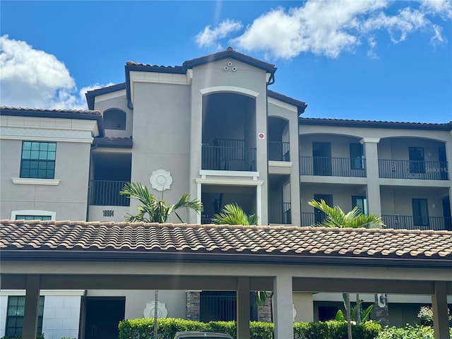 view of property with covered parking